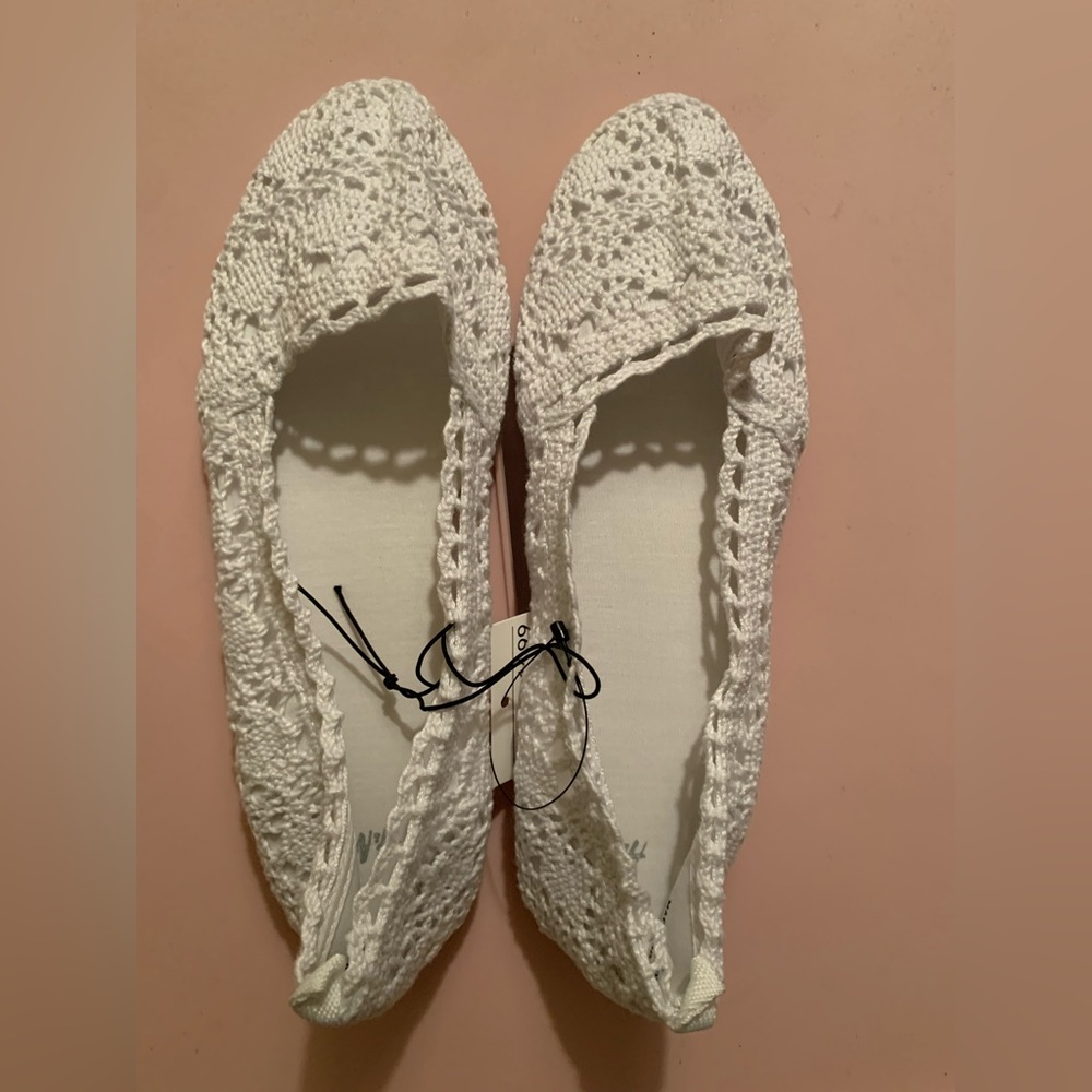 Girls white lace slip on shoe. Size 2